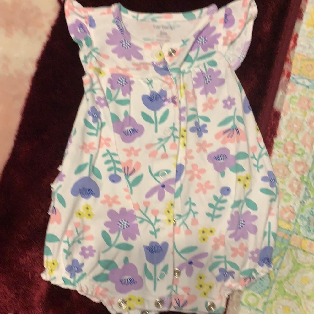 Snap up summer onesie. No stains